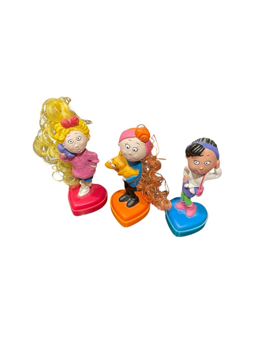 3 vintage girl collectible stamps with blonde, brunette, and red curls